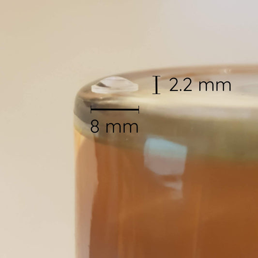 Measurements (8 mm x 2.2 mm) of the domed bumper feet.