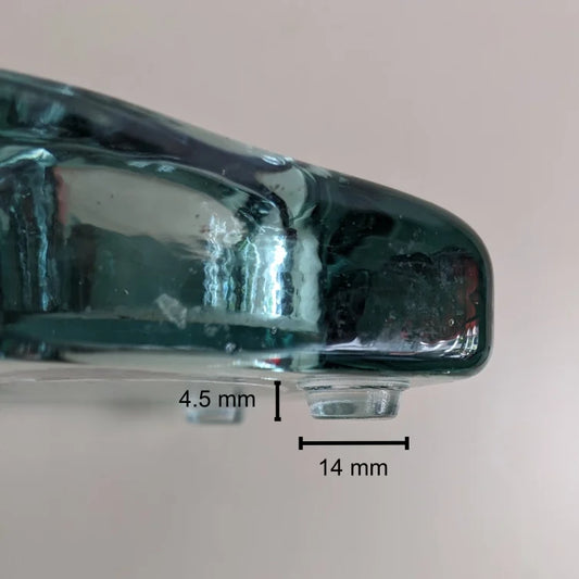 Measurements (14 mm x 4.5 mm) of the flat topped bumper feet.