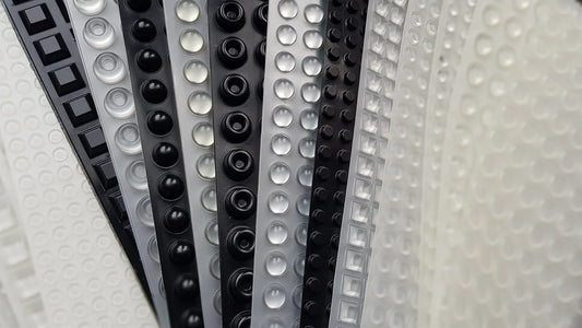 Full sheets of bumper feet of various sizes and clear or black.