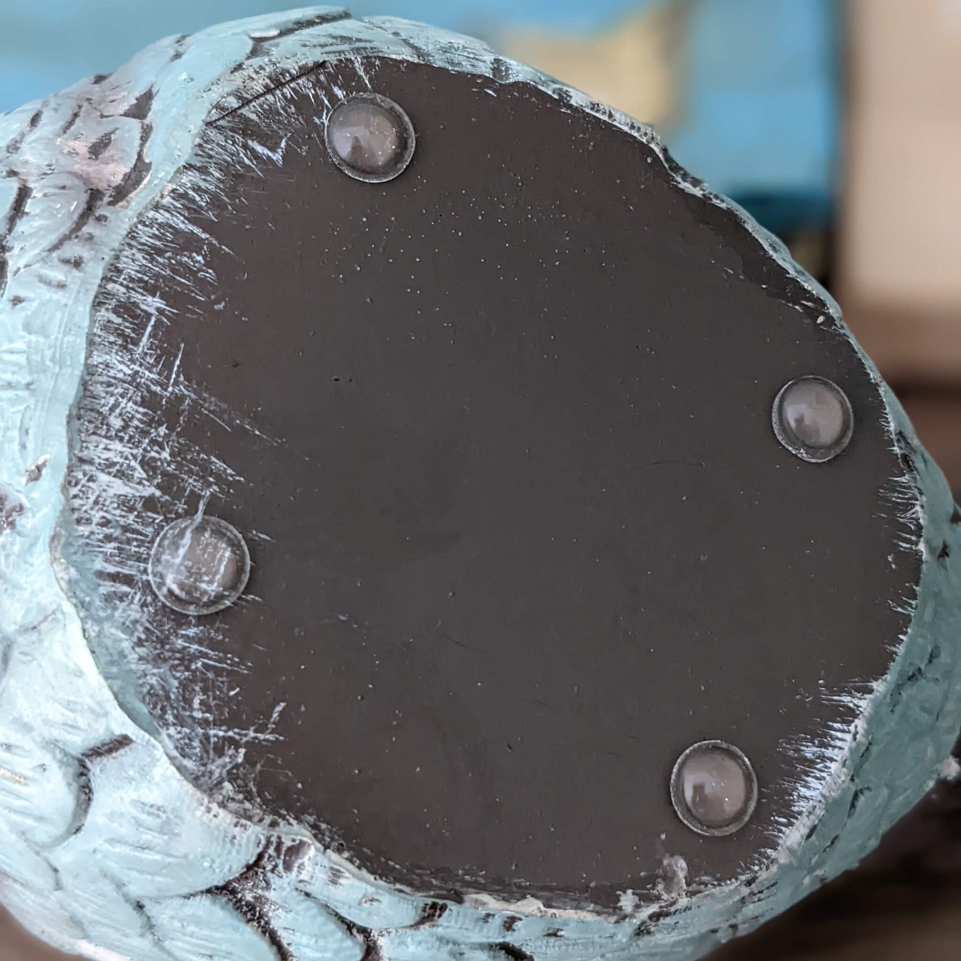Four  clear domed bumper feet used on the underside of a ceramic bird shaped ornament.