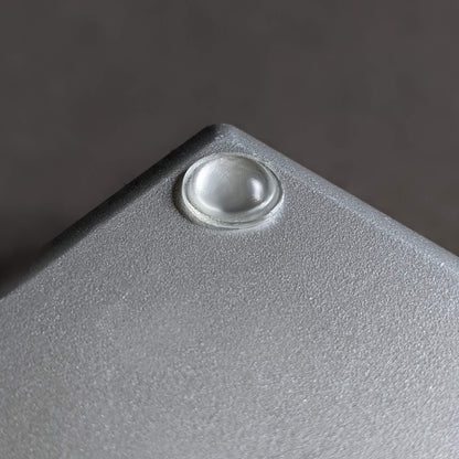 A single clear domed bumper foot used on the base of some electronic scales.