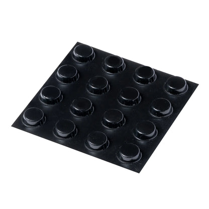 A sheet of 16 black flat topped bumper feet.