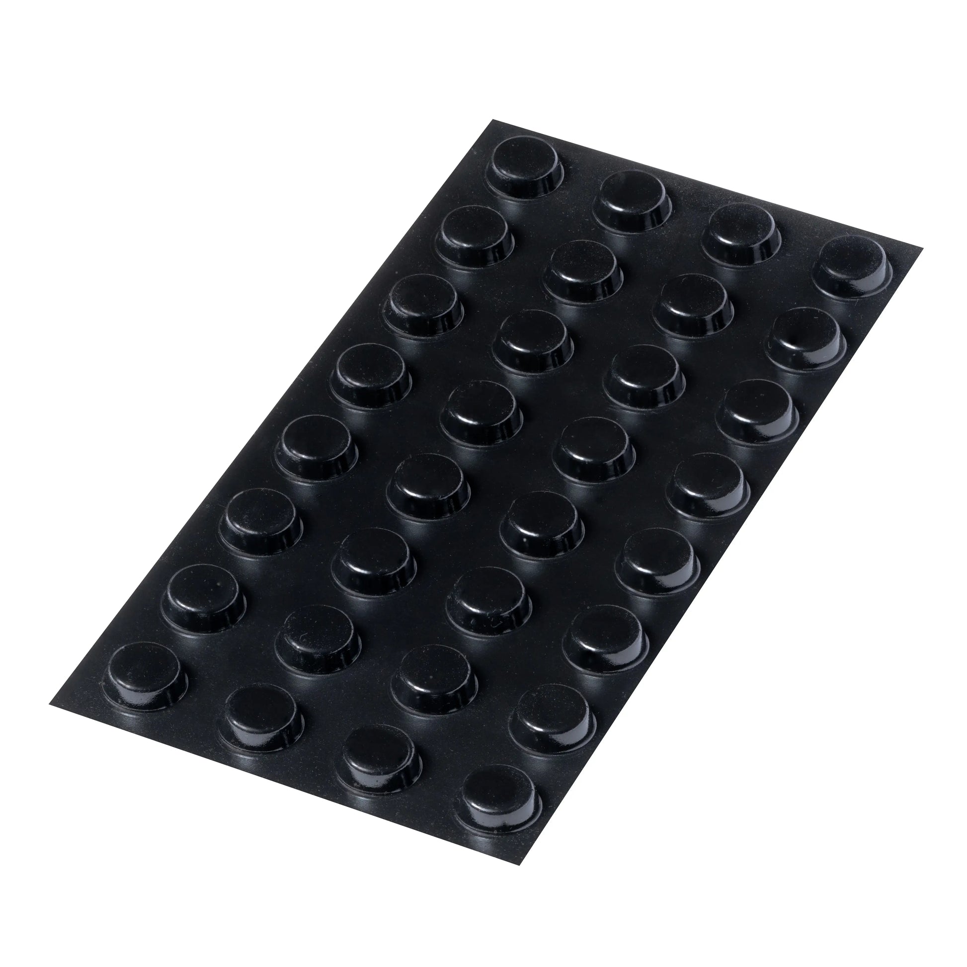 A sheet of 32 black flat topped bumper feet.
