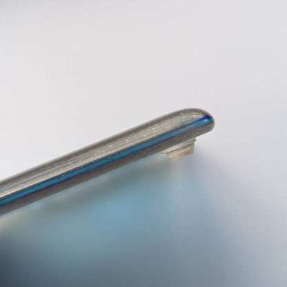 a clear mini sized bumper pad being utilised on the underside of a fused glass coaster. 