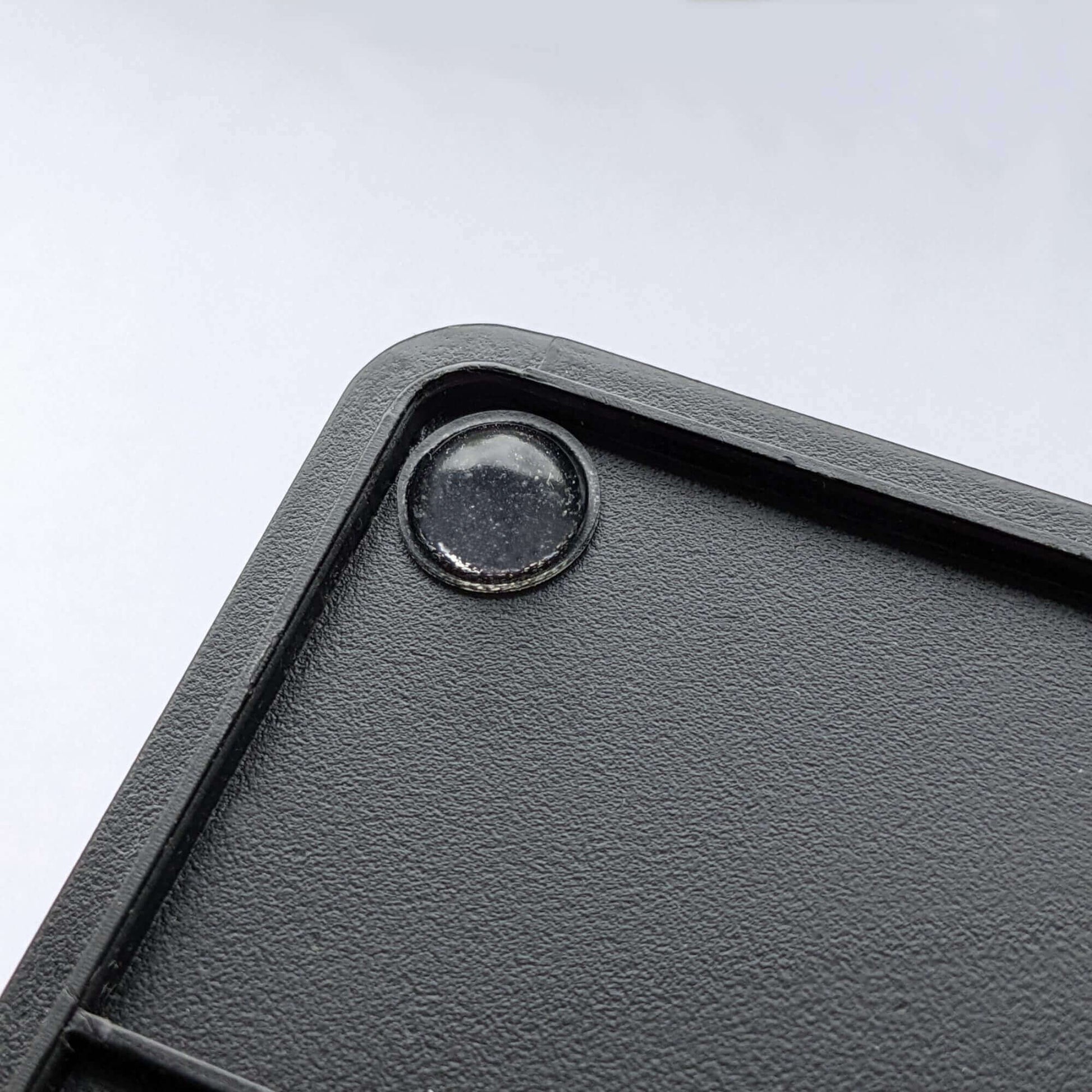 Domed bumper used on the base of a plastic A4 document in-tray