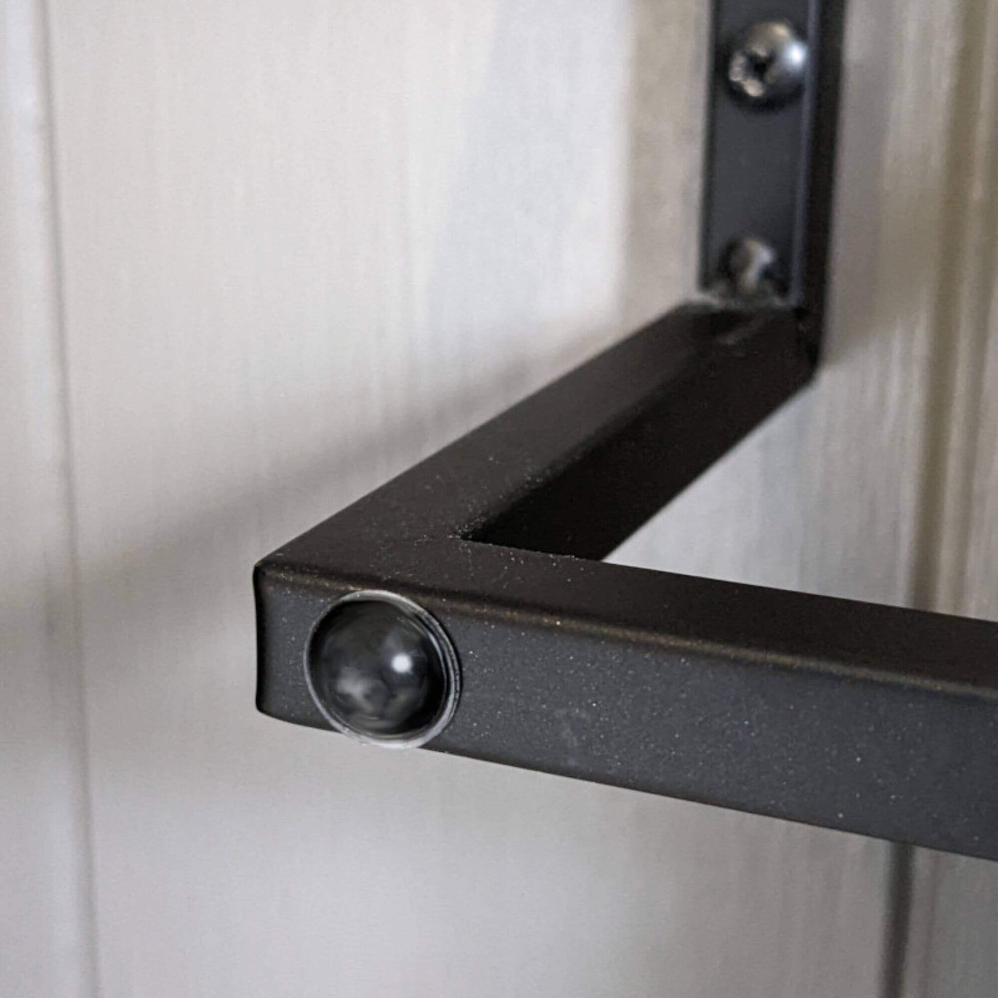 Domed bumper used on a towel rail to stop the door from being damaged when  in contact