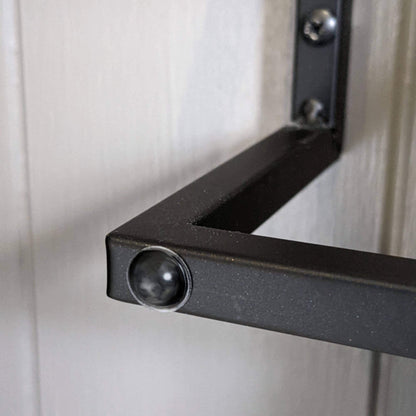 Domed bumper used on a towel rail to stop the door from being damaged when  in contact