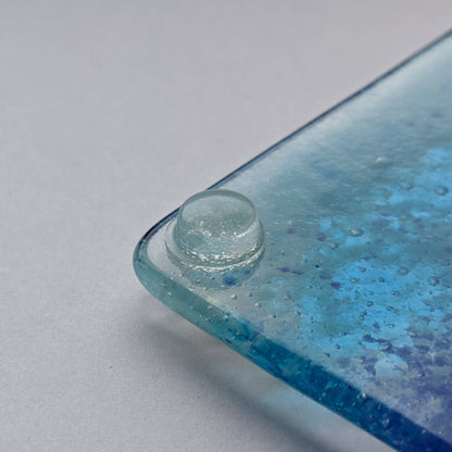 Clear bumper used on the corner of a glass coaster