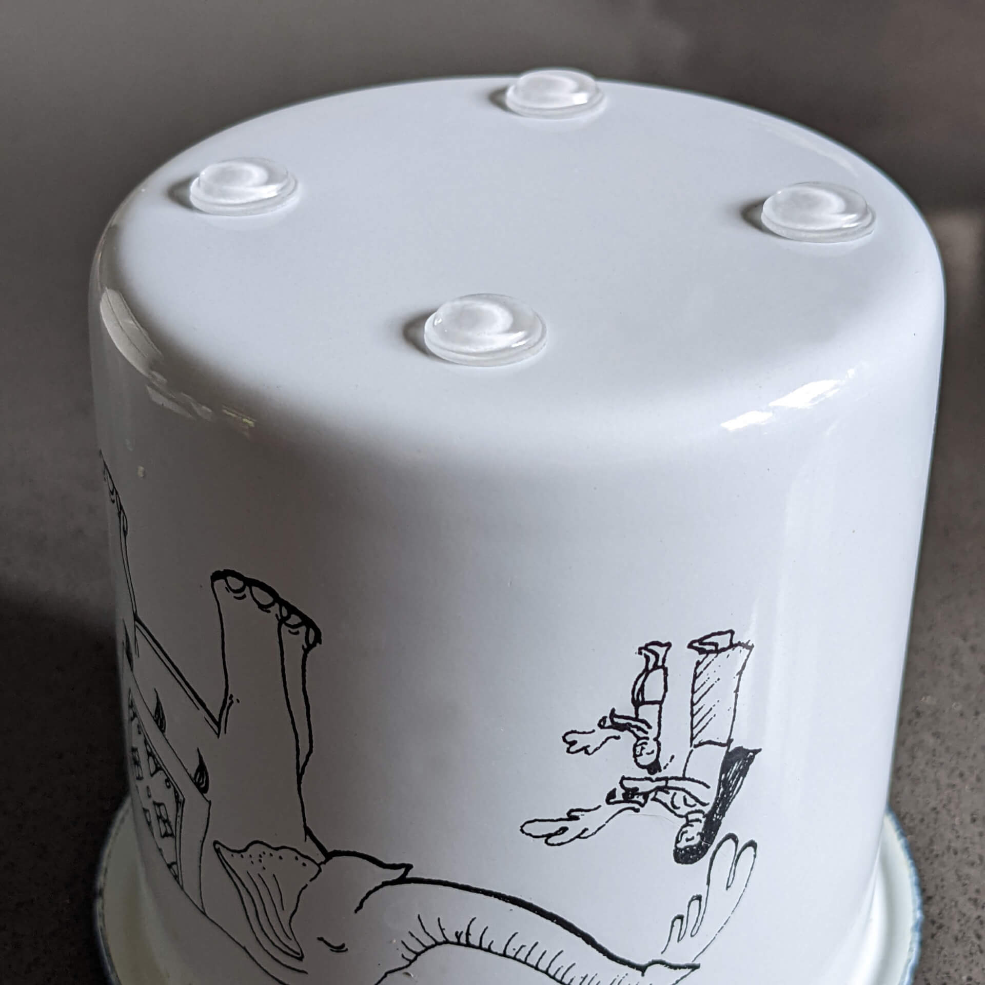 bumper feet being used on a decorative cup to help prevent slipping.