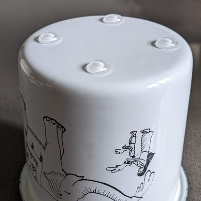 bumper feet being used on a decorative cup to help prevent slipping.