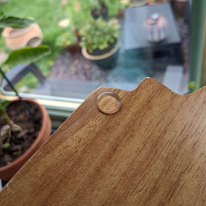 Flat bumper pad used to reduce sliding on a wooden chopping board