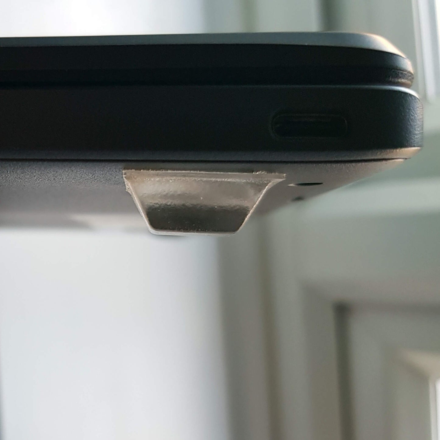 Square bumper used as feet on a laptop