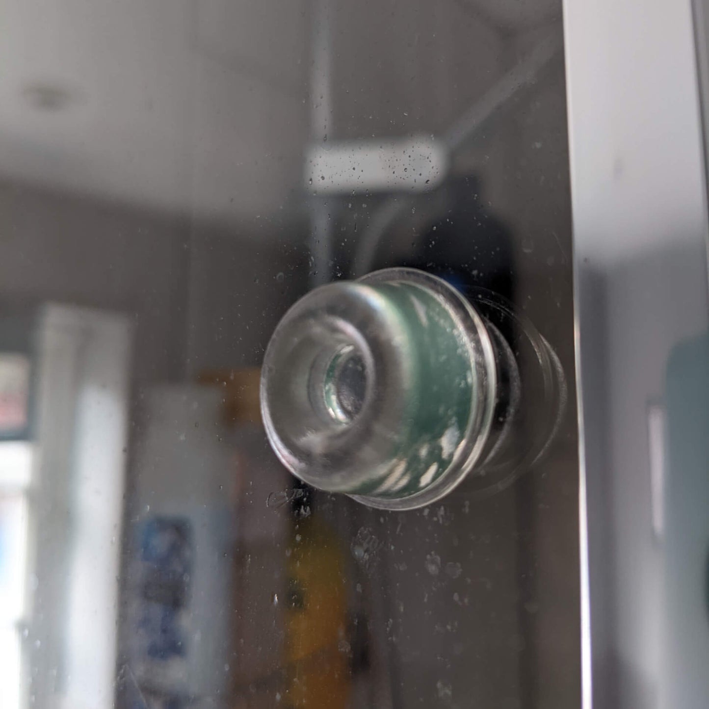 Recessed bumper used on glass