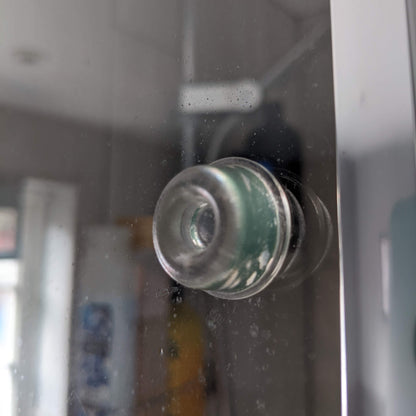 Recessed bumper used on glass
