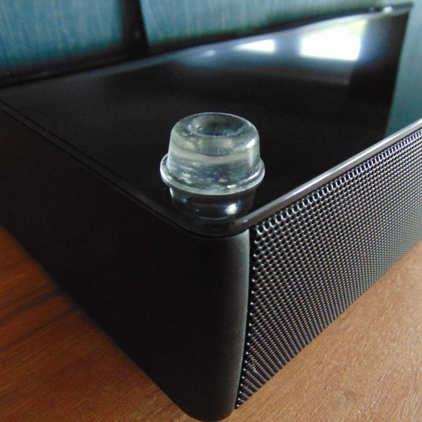 A recessed bumper foot used on the base of a speaker unit.