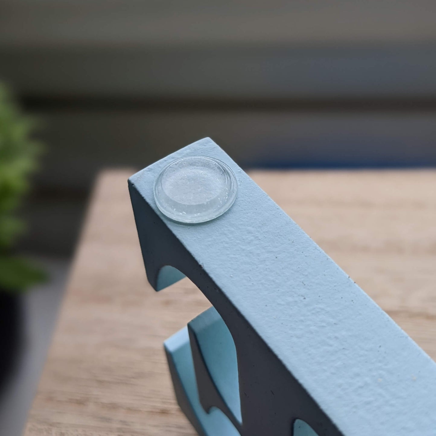 Clear flat bumper pad used on the corner of a decoration