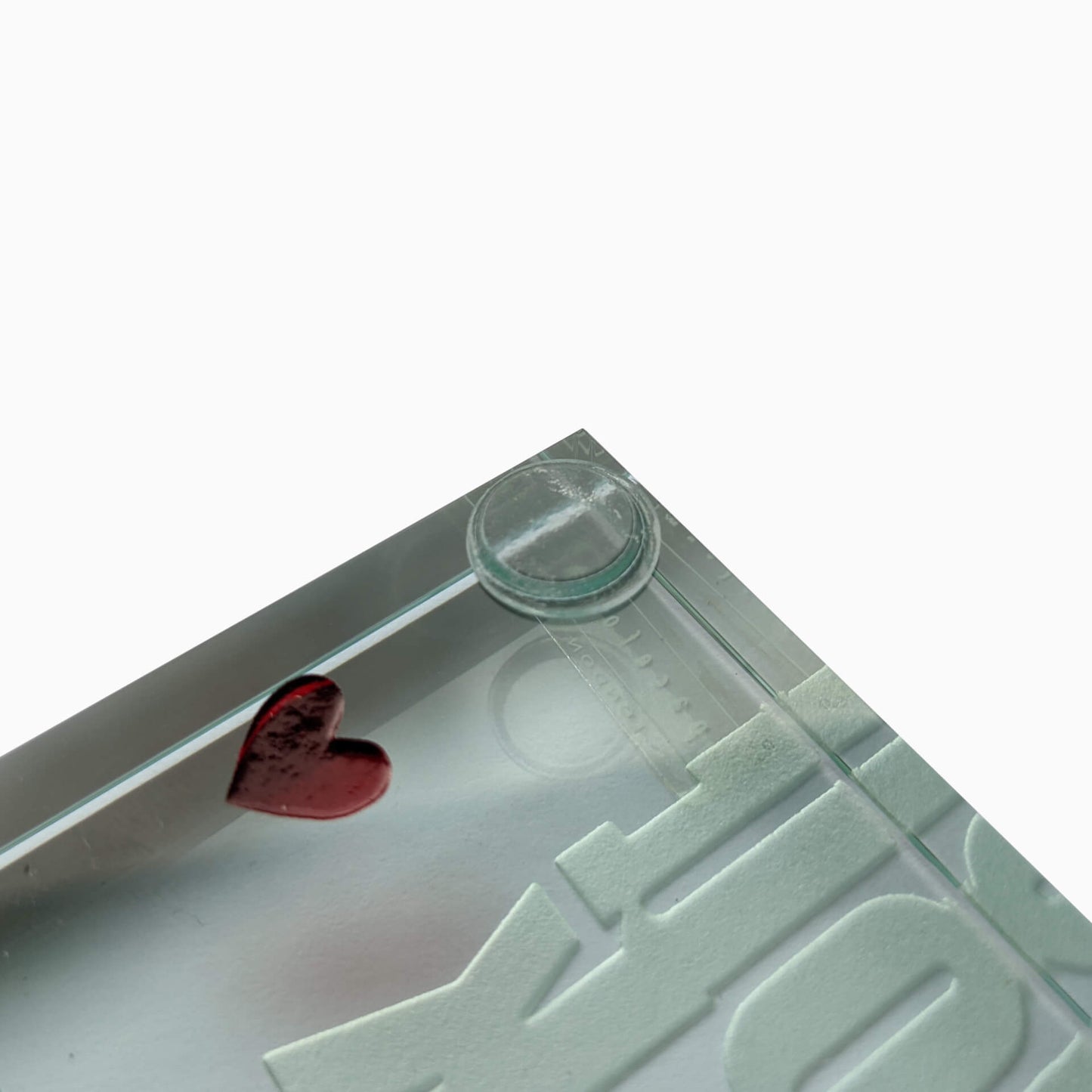 Bumper pad being used on the corner of a glass ornament