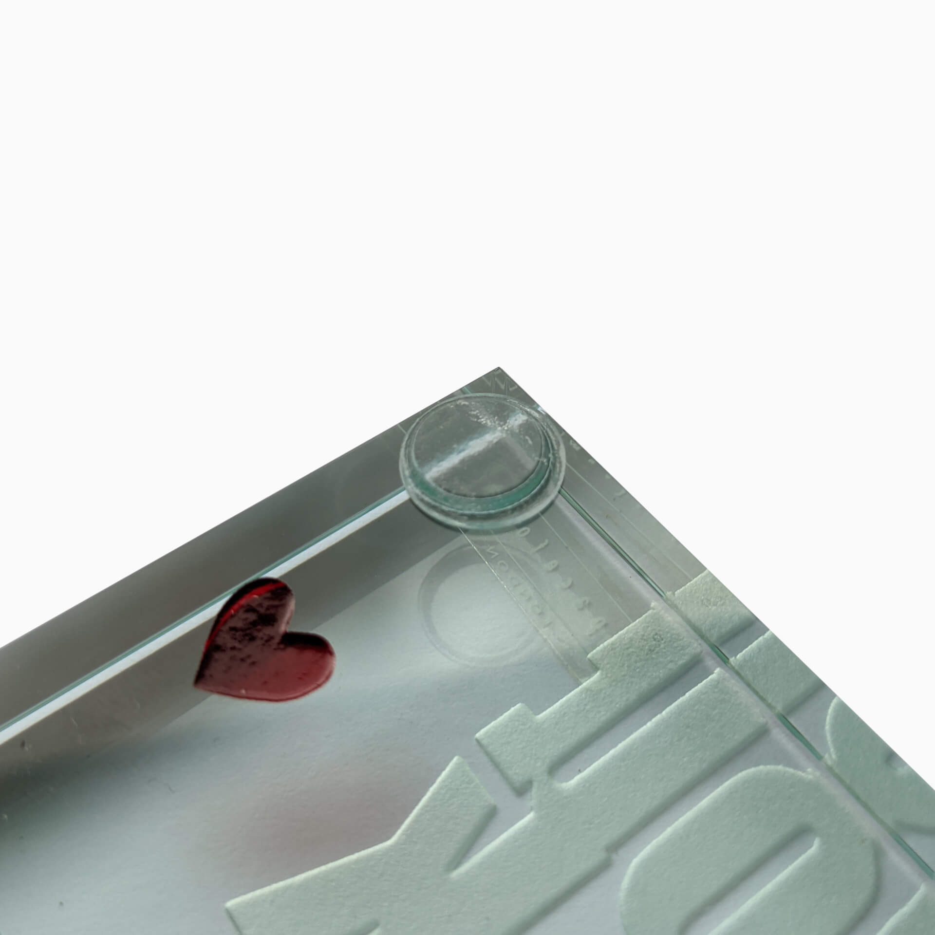 Bumper pad being used on the corner of a glass ornament